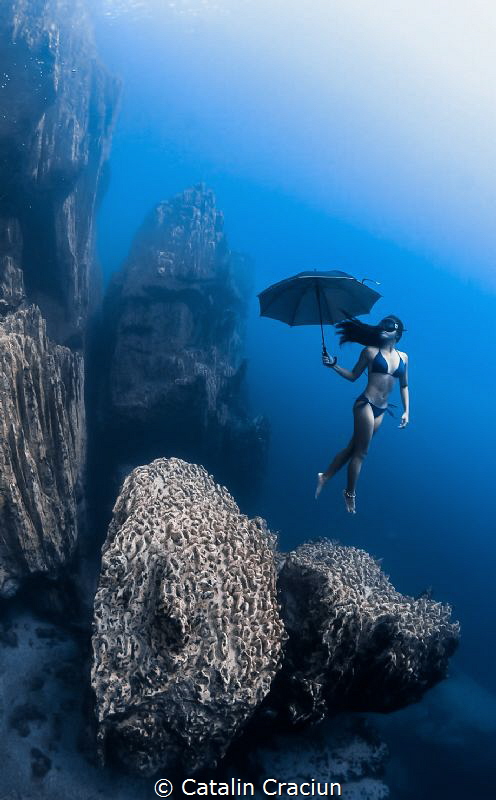 "Under my Umbrella"  taken on breath hold in Barracuda Lake at around 9m . Model :MJ Paula Jumuad 