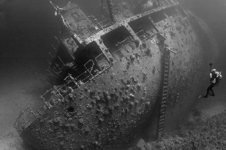 Photographer on the wreck of the Giannis D at Abu Nuhas. Nikon D70, natural light, orange filter, 16mm lens