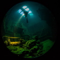 Diver inside the engine room of Kensho Maru
