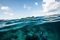 Sipadan island and a diver. Sipadan island and a diver.