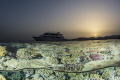 Red Sea at sun set- an over under shot of our live aboard boat.