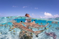 This is was a after wedding shoot, trash the dress with the sharks in Bora Bora.