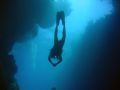 Diver silhouette, spooky channel, Roatan, Honduras. Taken with Canon A95
