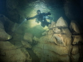 This picture is taken in the Marchepied cave in France. The entrance is narrow and sidemount only.
