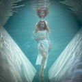 This shot was created in an indoor pool with a decor made with fabrics and a mirror.