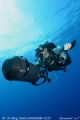 A diver running his gavin scooter in the bay of Haifa.