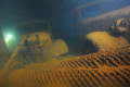 This was shot inside the Hoki Maru at 142' with my Nikon D300 housed by Aquatic. 1940s vintage trucks and cars
