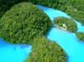 The Milky Way in Palau from a helicopter. This is the true colour of this water.