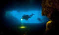Divers in cave exploration