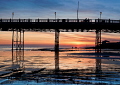 Sunset on the seafront at Worthing Pier, West Sussex.