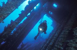 Entering the wreck of the Carnatic. 20mm lens by Len Deeley 