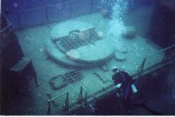 Diver at Mid-Ship an the Wreck of the Tibbits. Cayman Bra... by Kevin Robert Panizza 