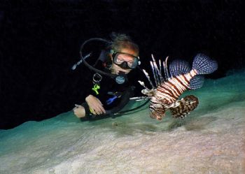 Jane and a Lionfish   Red Sea Nikonos V by Nicolai Sosnowski 