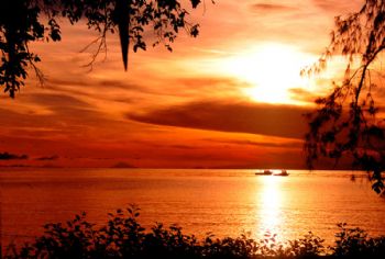 Sunrise, Walindi, WNB, PNG:  Nikon D100 - 17mm Nikkor lens by Rick Tegeler 