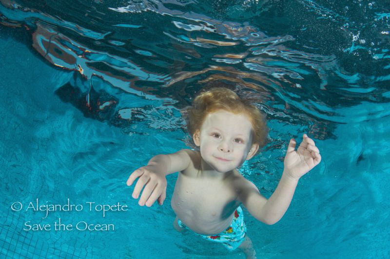 Child in Pool, Mexico by Alejandro Topete 