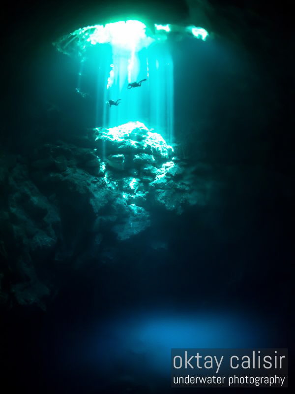 Decompressing divers after a cave dive into the 'The Pit'... by Oktay Calisir 