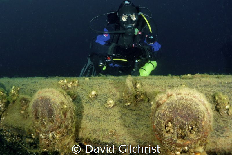 Diver poses at a set of Deadeyes on the Barque 'Arabia', ... by David Gilchrist 