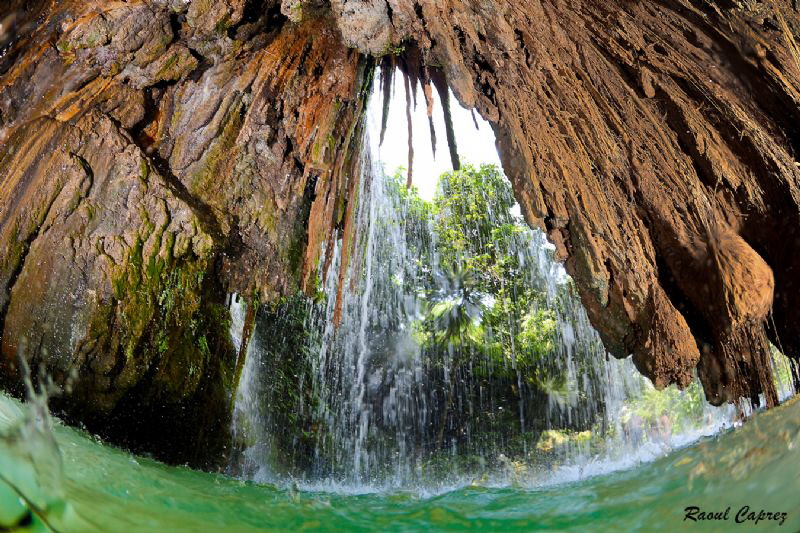 Behind the water curtains by Raoul Caprez 