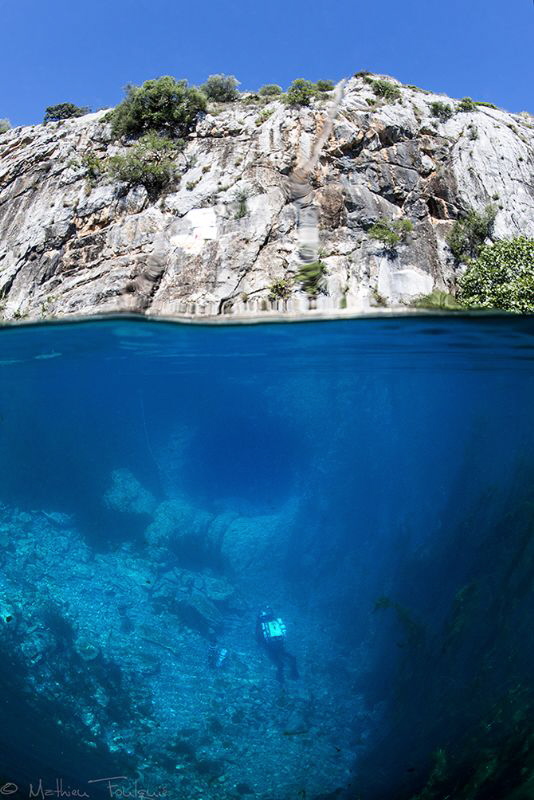 hole in the wall (Font Estramar resurgence) by Mathieu Foulquié 
