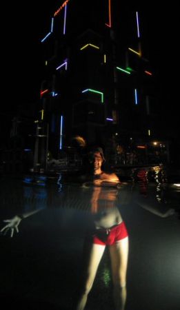 Rob in our Hotel pool, the hat is to remind him not to ge... by Dawn Watson 