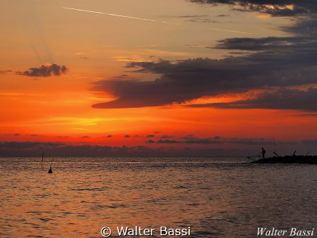 The sea and the fisherman by Walter Bassi 