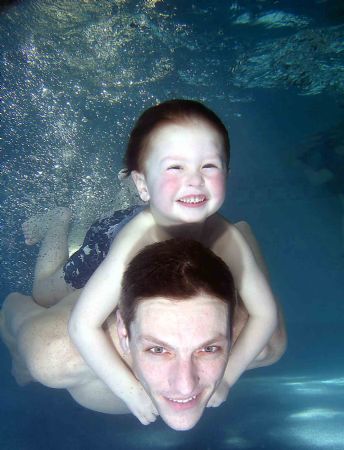 diving piggy back - baby swimming club learning to dive w... by John Akar 