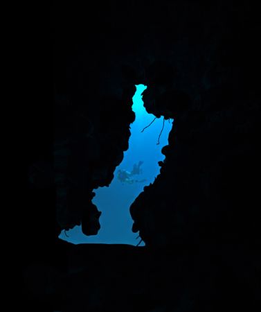 Diver's exiting cave in Cozumel. Taken with a Canon 5D in... by Stephen Giordano 