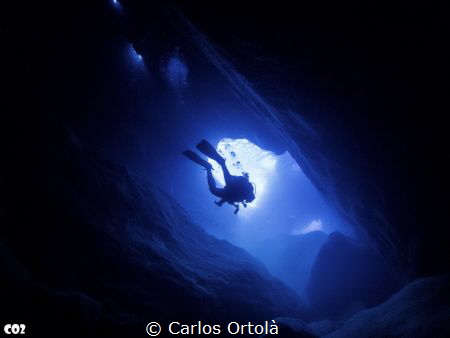 Neptune's cave exit. Portichol Island. Javea. by Carlos Ortolà 