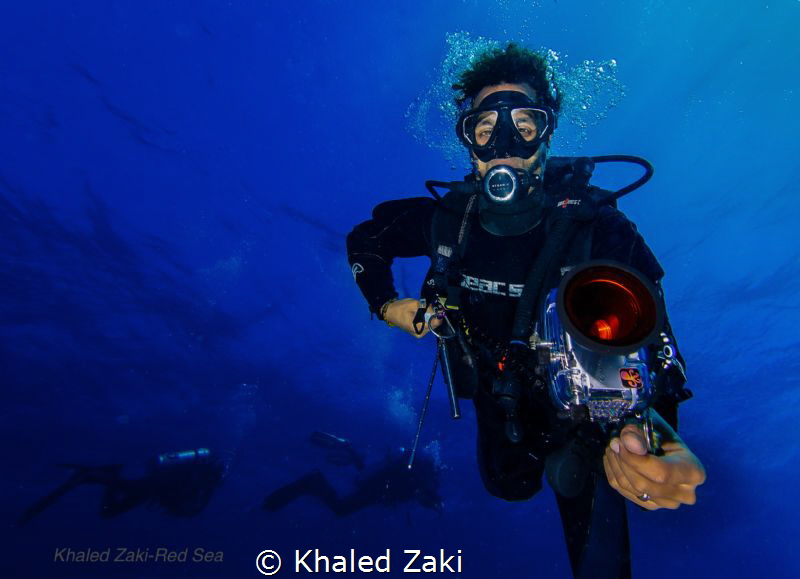 Ras Mohamed Red Sea Divers with a fish eye by Khaled Zaki 