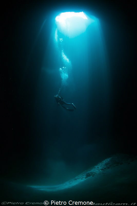 Cave and diver by Pietro Cremone 