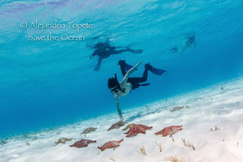Stars and snorkelers, Cozumel Mexico by Alejandro Topete 