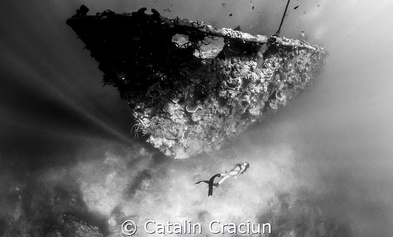 Freediving one of the many wrecks in Coron Bay . Photo ta... by Catalin Craciun 