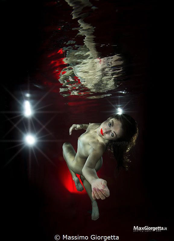naked in swimmpool the mermaid by Massimo Giorgetta 