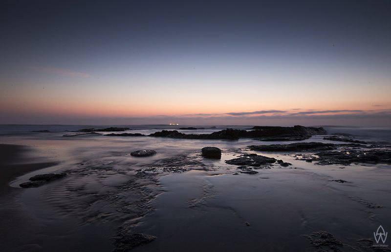 The end of a great day on the ocean and the promise of an... by Allen Walker 