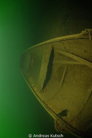 a Little wreck in a lake in germany by Andreas Kutsch 
