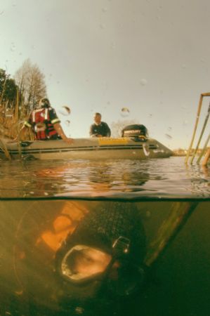 Police diver searching for body in lake in Johannesburg. ... by Fiona Ayerst 