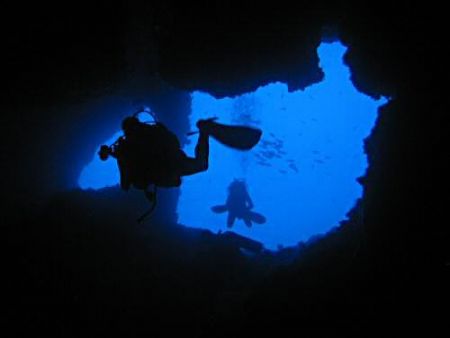 Cave divers in Raja Ampat by Dawn Watson 
