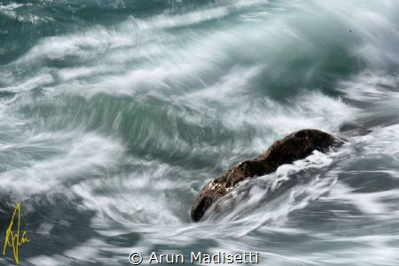 Holding firm despite the surge, passing of hurricane Joae... by Arun Madisetti 