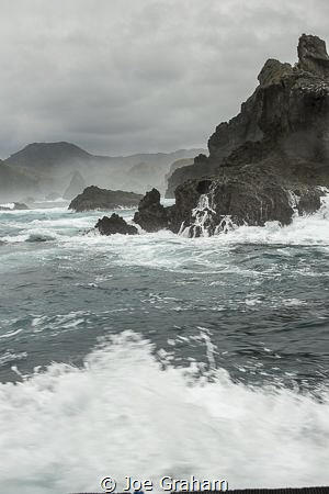 Shot taken on our way out to the Dive Site "The Magnet" o... by Joe Graham 