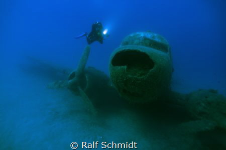 Old airplane in the bay of Kas by Ralf Schmidt 