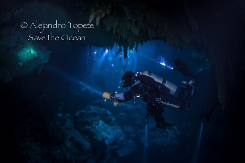 Divers in the Pit, Cenote Pit, Playa del Carmen México by Alejandro Topete 