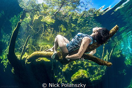 Kicking back in Cenote Jardin Del Eden by Nick Polanszky 