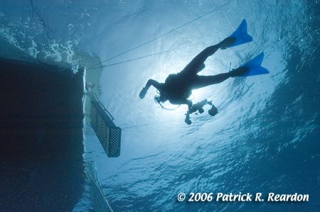 Sillouette of my wife, Debra, returning to the T&C Aggres... by Patrick Reardon 