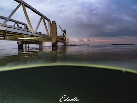 Pier at lake Grevelingen by Eduard Bello 