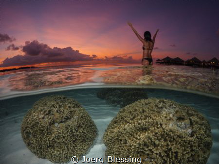 Sunset on a calm evening in Maldives.. by Joerg Blessing 
