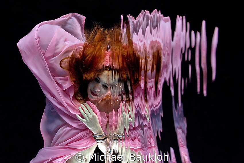 Redhead in the swimming pool by Michael Baukloh 