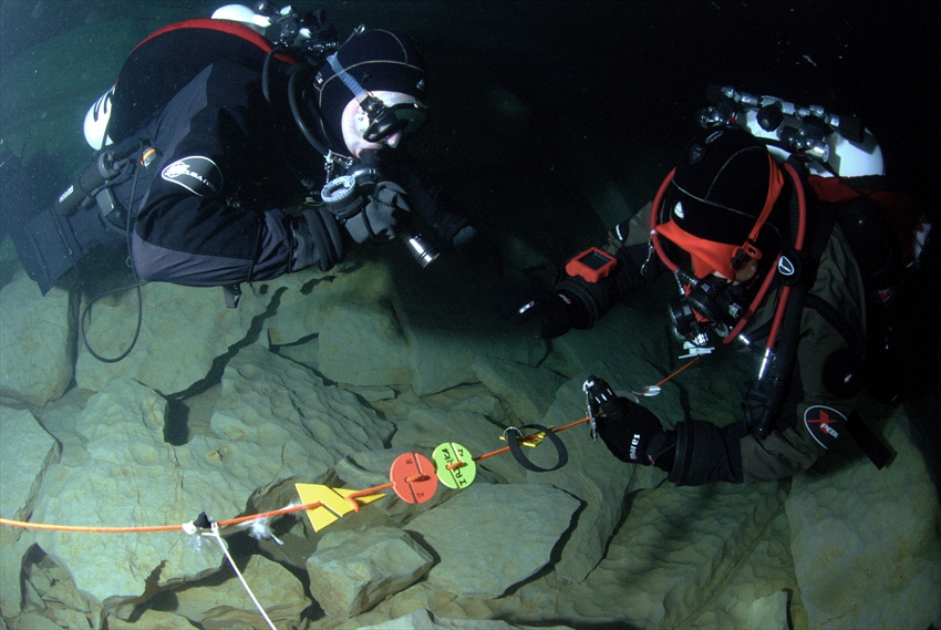 Cave divers by Andy Kutsch 