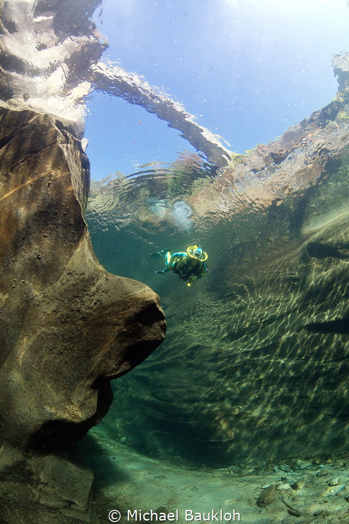 Under the bridge, Verzasca by Michael Baukloh 