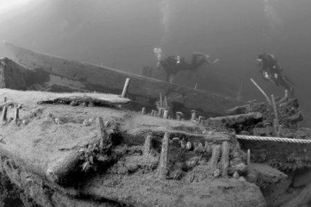 Divers on James C. King wreck in cold waters of Lake Huro... by David Heidemann 