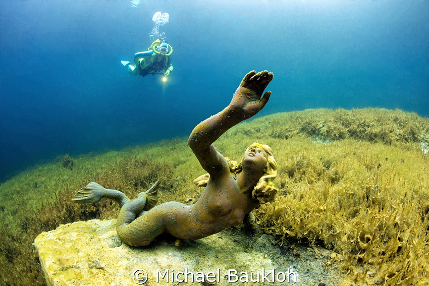 Mermaid in the mountain lake by Michael Baukloh 